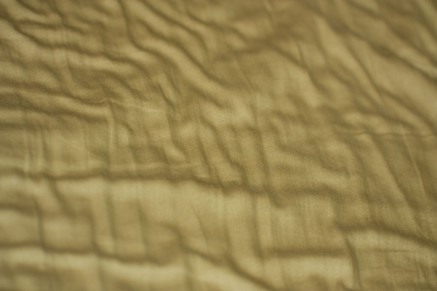 Fabric Waves - Thumbnail of gentle folds & waves in olive green fabric