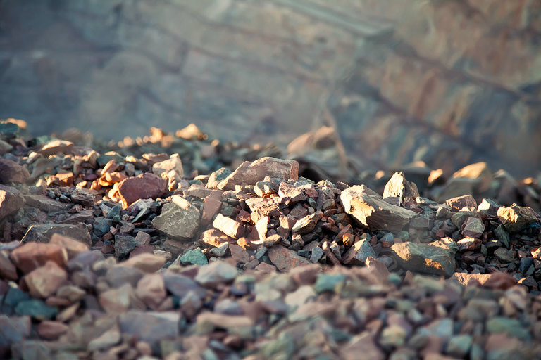 Beautiful colours in the broken rocks at the edge of the Superpit 